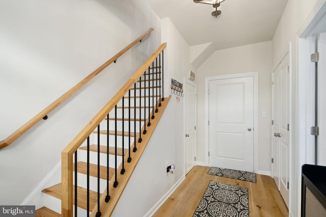 entryway with light hardwood / wood-style floors