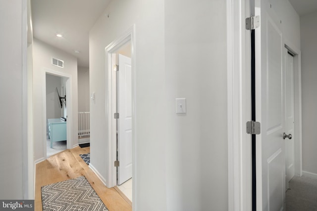 hallway featuring light wood-type flooring