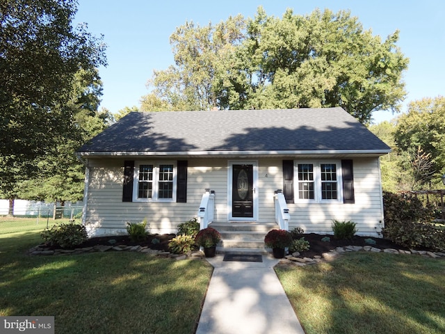 view of front of house with a front lawn