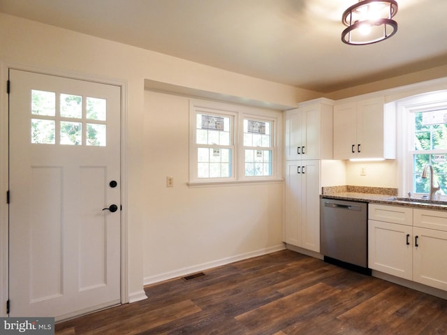 kitchen featuring dishwasher, white cabinets, sink, and dark hardwood / wood-style flooring