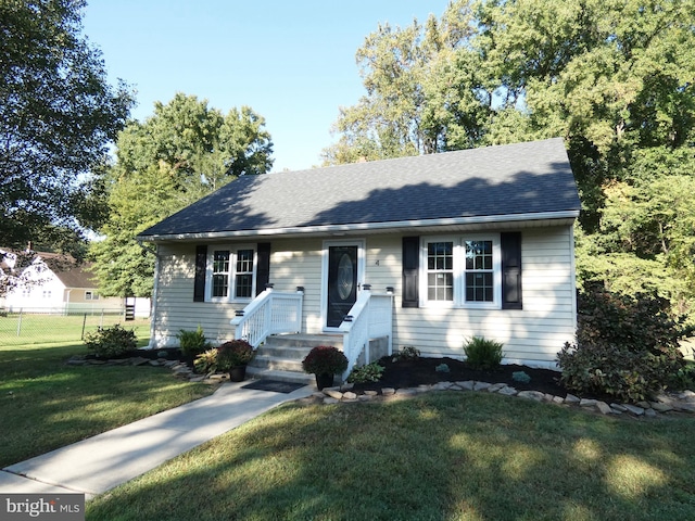 view of front of home featuring a front lawn