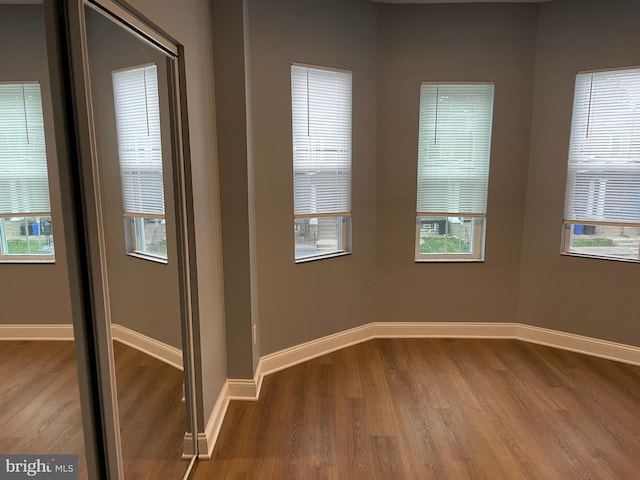 empty room featuring hardwood / wood-style floors