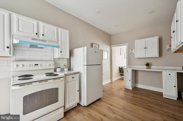 kitchen featuring light hardwood / wood-style floors, decorative backsplash, white appliances, and white cabinets