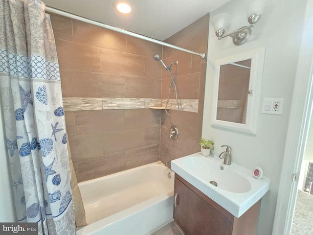 bathroom with vanity and shower / bathtub combination with curtain