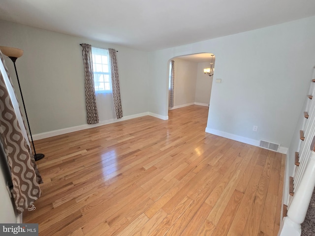 empty room with light wood-type flooring