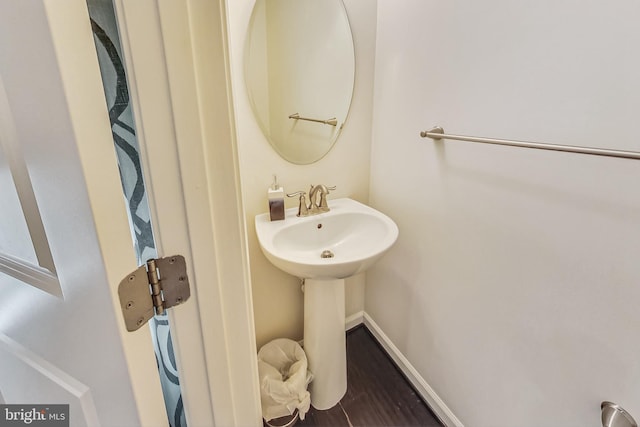 bathroom featuring hardwood / wood-style flooring