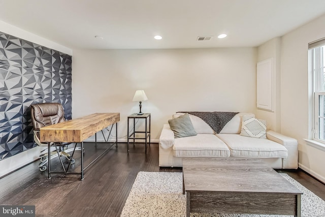 living room with dark hardwood / wood-style floors