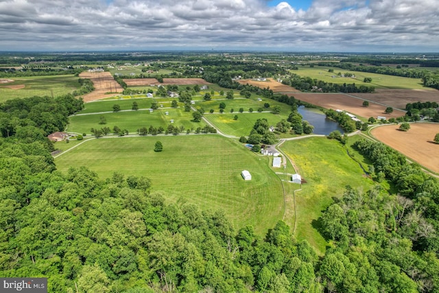 aerial view with a rural view and a water view