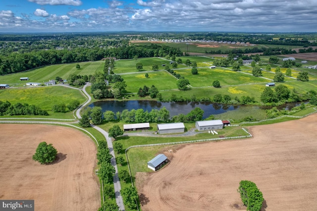 aerial view featuring a rural view and a water view