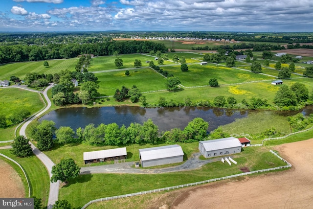 bird's eye view with a water view and a rural view