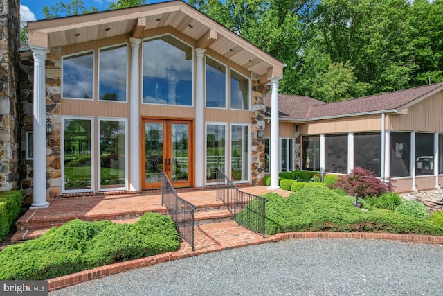 exterior space featuring a sunroom