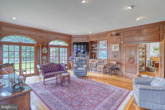 living room with light hardwood / wood-style flooring