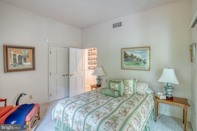 carpeted bedroom featuring a closet