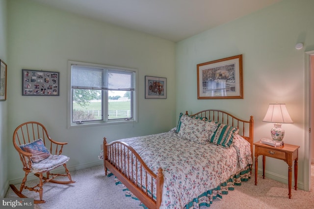 bedroom with light carpet