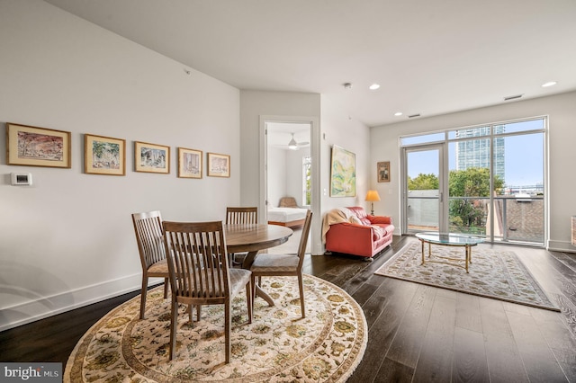 dining room featuring dark hardwood / wood-style flooring