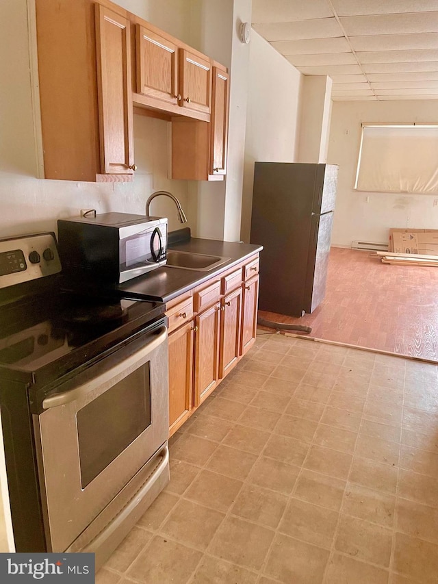 kitchen with appliances with stainless steel finishes and sink