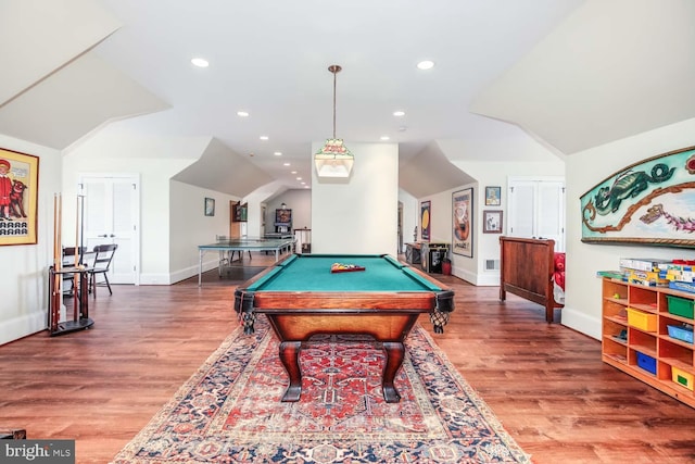 recreation room featuring vaulted ceiling, pool table, and hardwood / wood-style flooring