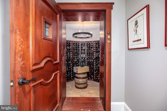 wine room with dark hardwood / wood-style floors