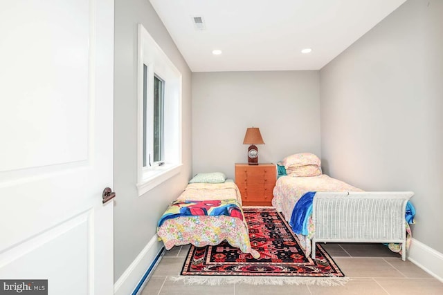 bedroom featuring tile patterned floors