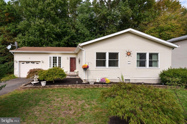 single story home with a garage and a front yard