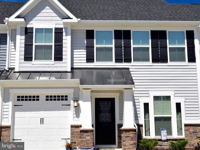 view of front of house with a garage