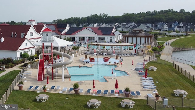 exterior space with a patio and a water slide