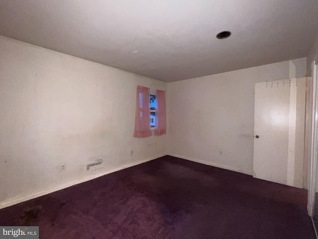 spare room with carpet flooring