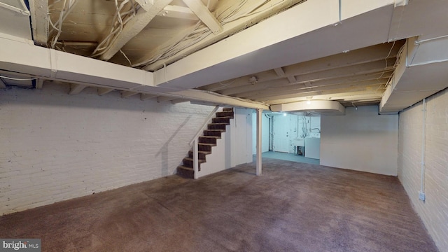 basement featuring washing machine and dryer