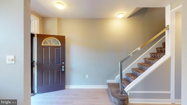 entrance foyer with light hardwood / wood-style flooring