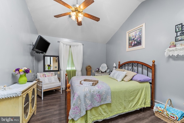 bedroom with ceiling fan, lofted ceiling, and dark hardwood / wood-style floors