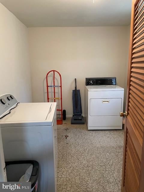 laundry area featuring separate washer and dryer