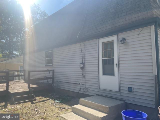 doorway to property with a deck