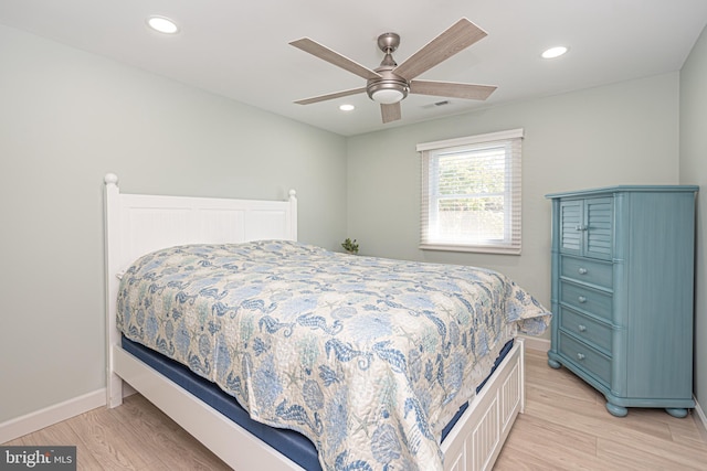 bedroom featuring ceiling fan and light wood-type flooring