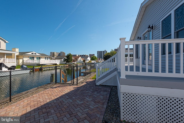 view of patio / terrace with a water view