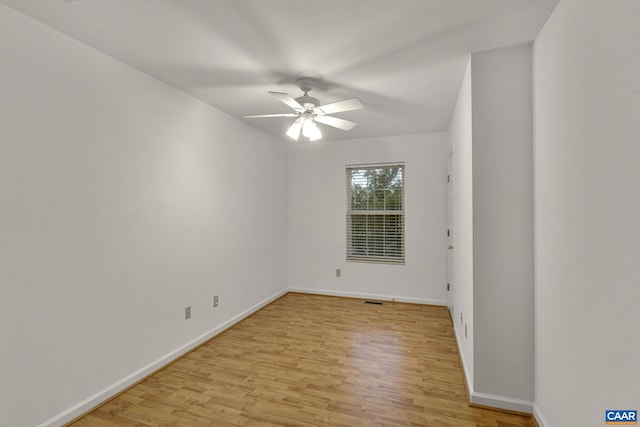 unfurnished room featuring ceiling fan and light hardwood / wood-style flooring