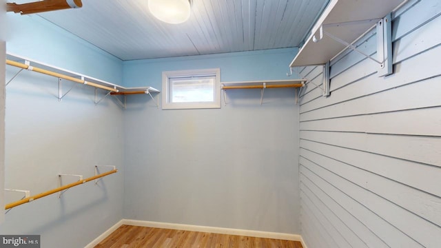 spacious closet with wood finished floors