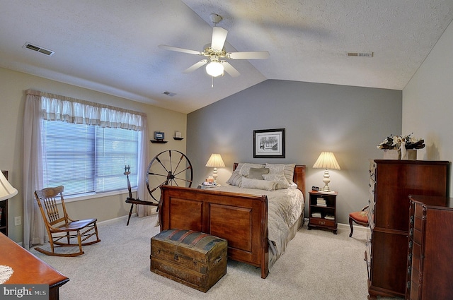 bedroom with light carpet, lofted ceiling, and ceiling fan