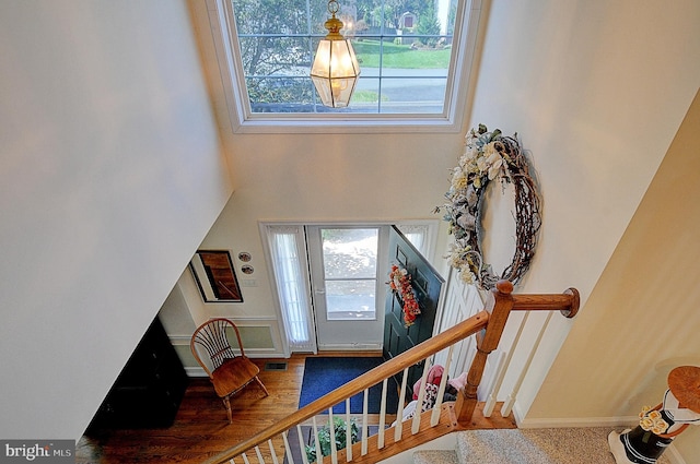 foyer with wood-type flooring