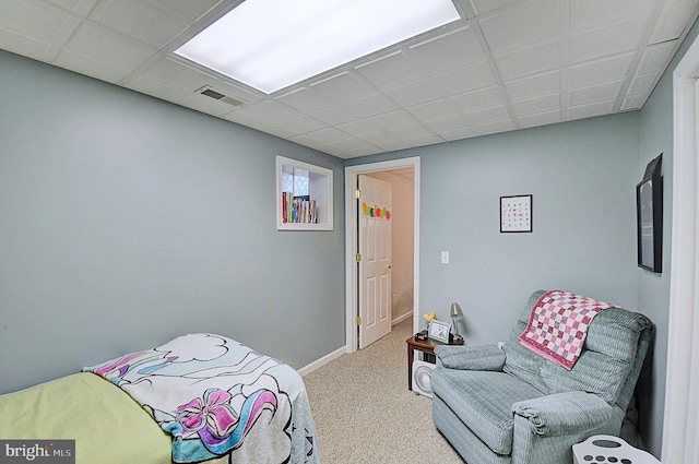 bedroom featuring light colored carpet