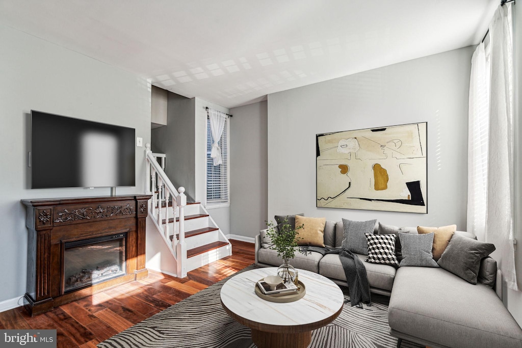 living room with dark wood-type flooring