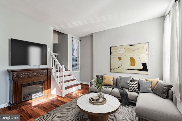 living room with dark wood-type flooring