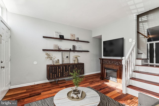 living room featuring dark hardwood / wood-style floors