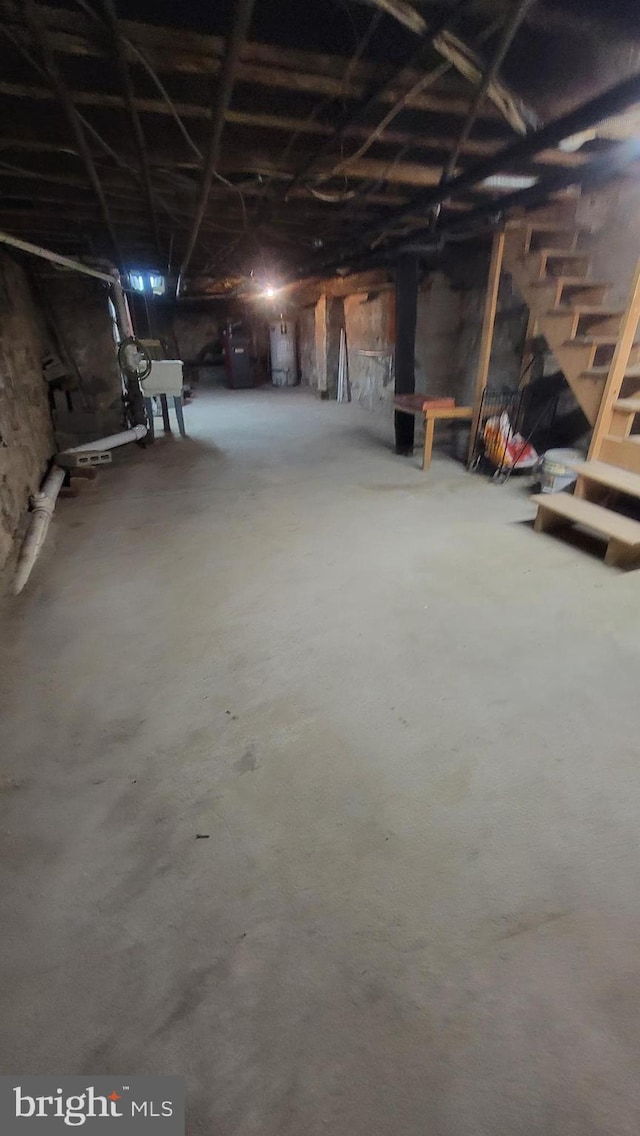 basement featuring gas water heater