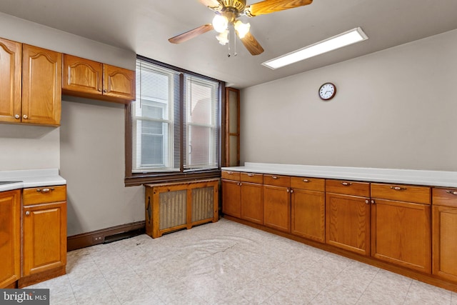 kitchen featuring ceiling fan