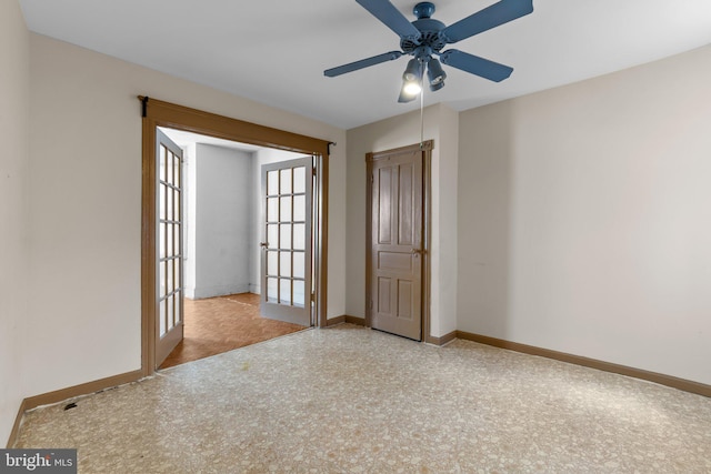 empty room featuring ceiling fan