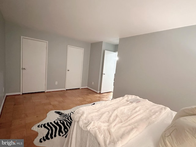 bedroom with light hardwood / wood-style flooring