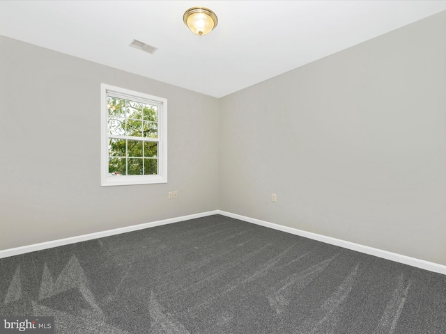 spare room with carpet flooring