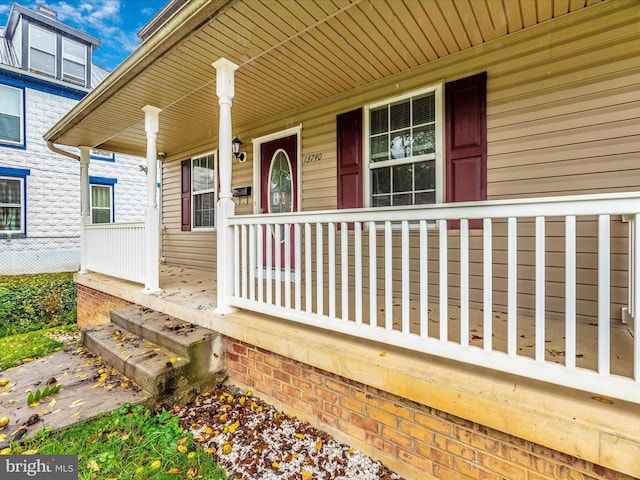 entrance to property with covered porch