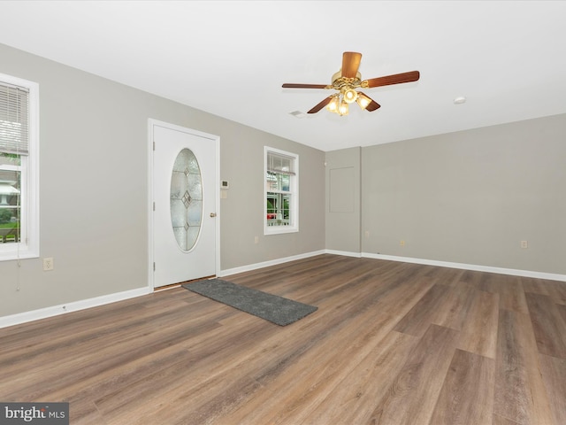 entrance foyer with wood-type flooring and ceiling fan