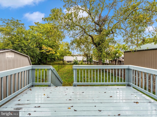 deck featuring a yard